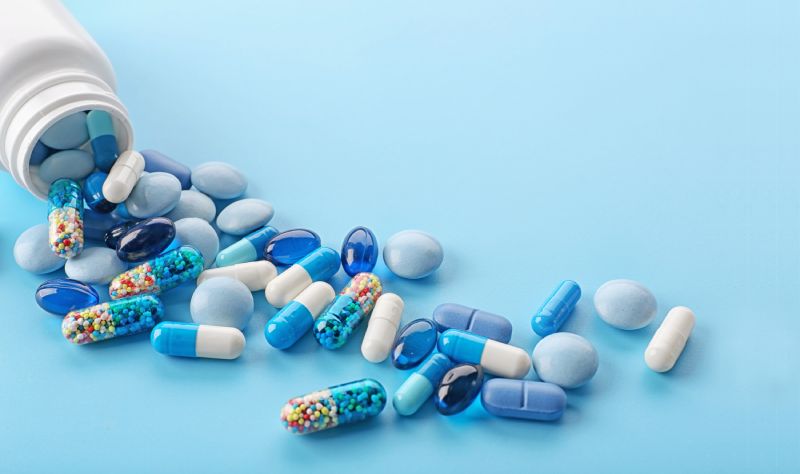 medicine and cells in an abstract scientific background